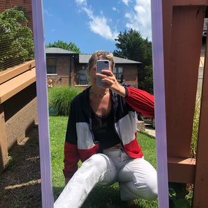 red, white, and blue windbreaker with hood